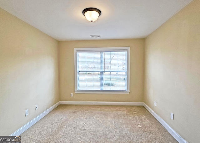 view of carpeted spare room