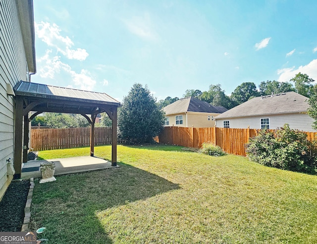 view of yard featuring a gazebo and a patio area