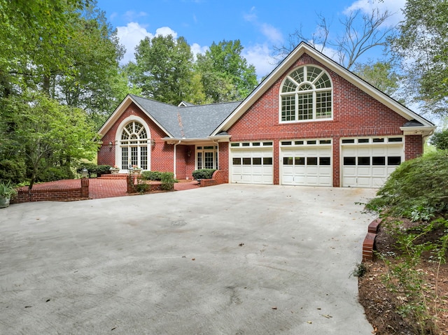 front facade with a garage