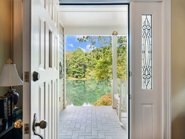 entryway with a water view