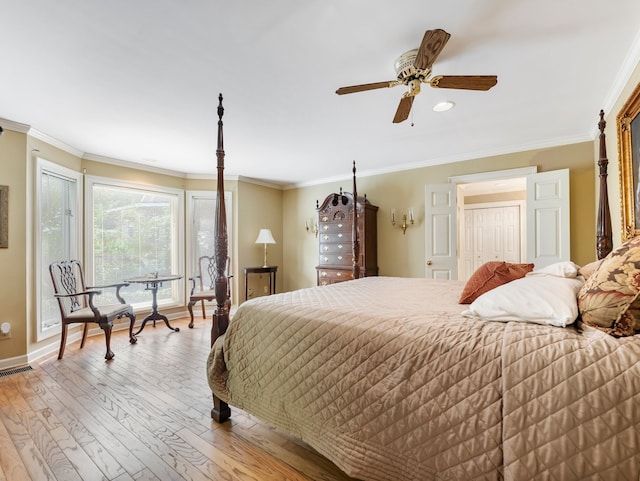 bedroom with ceiling fan, a closet, light hardwood / wood-style flooring, and ornamental molding