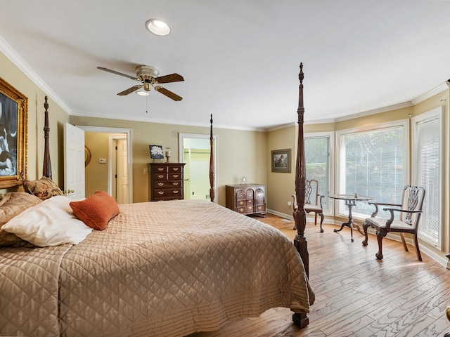 bedroom featuring light hardwood / wood-style floors, ceiling fan, and crown molding