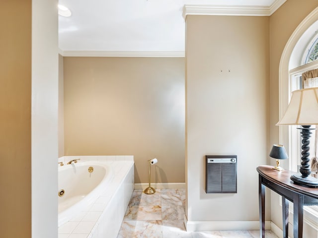 bathroom with ornamental molding, a relaxing tiled tub, and heating unit