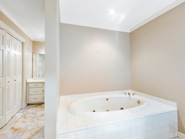 bathroom featuring vanity, tiled bath, and ornamental molding