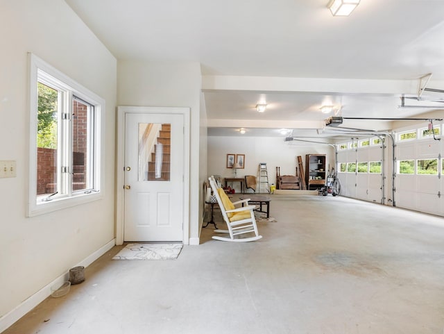 4394 Holly Springs Rd, Pendergrass, GA 30567 - foyer featuring baseboards, concrete floors, and a wealth of natural light