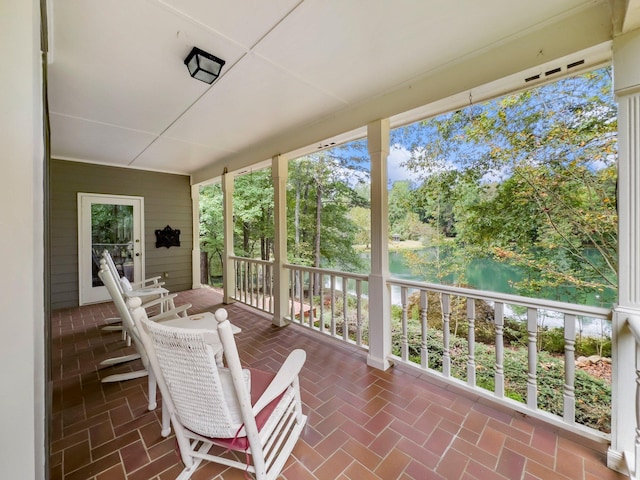 4394 Holly Springs Rd, Pendergrass, GA 30567 - sunroom / solarium featuring a water view