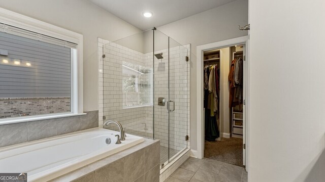 carpeted bedroom with ornamental molding, a tray ceiling, and ceiling fan