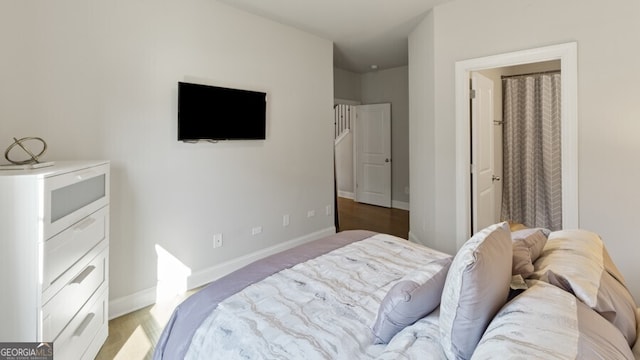 bedroom featuring light wood-type flooring