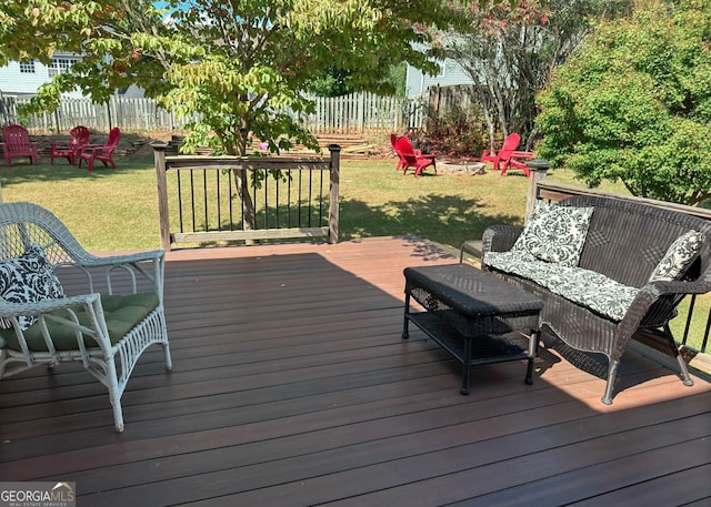 2206 Sugar Maple Ct NW, Acworth, GA 30101 - wooden terrace featuring a fire pit, fence, and a lawn