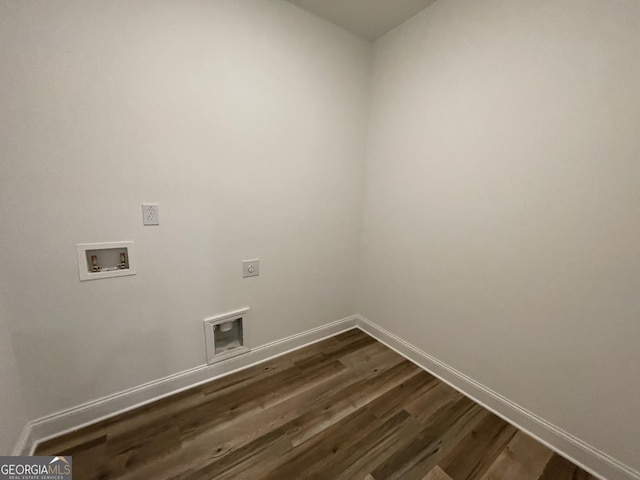 laundry area with hookup for an electric dryer, dark hardwood / wood-style flooring, and hookup for a washing machine