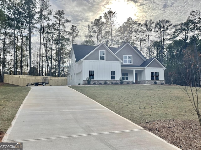 view of front of home with a front lawn