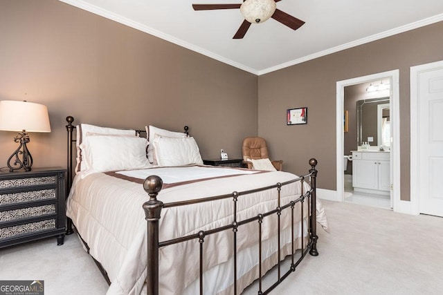 bedroom with light carpet, ensuite bath, ceiling fan, and ornamental molding