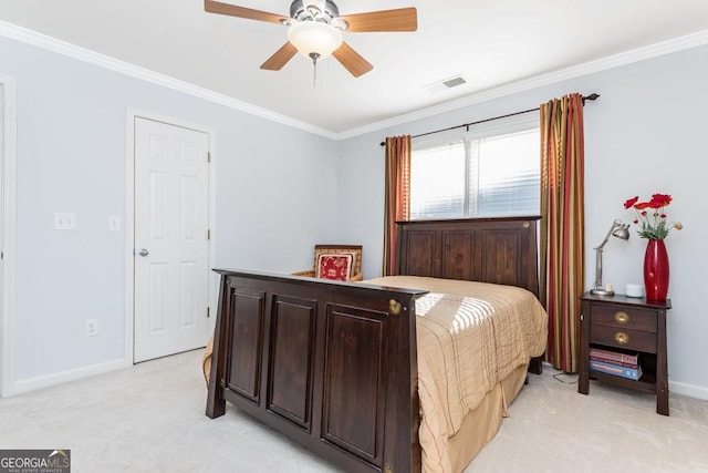 bedroom with light colored carpet, ceiling fan, and ornamental molding