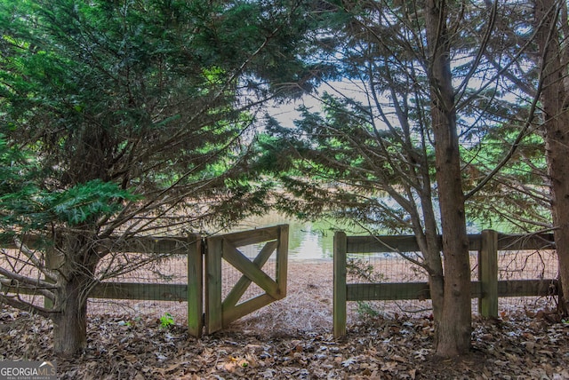 view of outbuilding featuring a water view