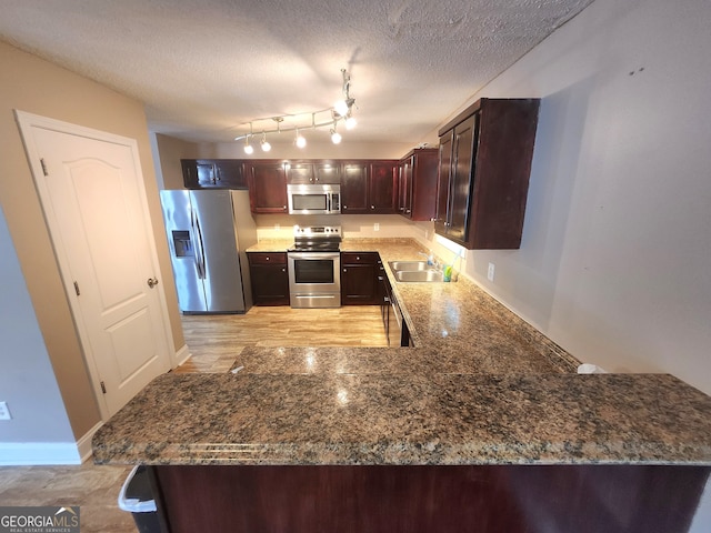 unfurnished room with hardwood / wood-style flooring, plenty of natural light, wooden walls, and ceiling fan