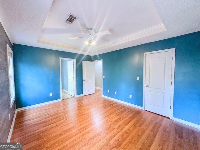 full bath featuring baseboards, vanity, toilet, and shower / tub combo with curtain