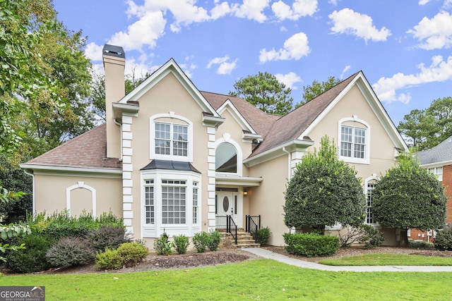 front of property featuring a front yard