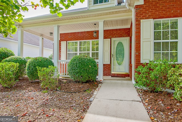 entrance to property with a porch