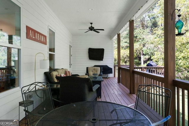 wooden deck with ceiling fan