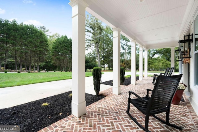 view of patio featuring a porch