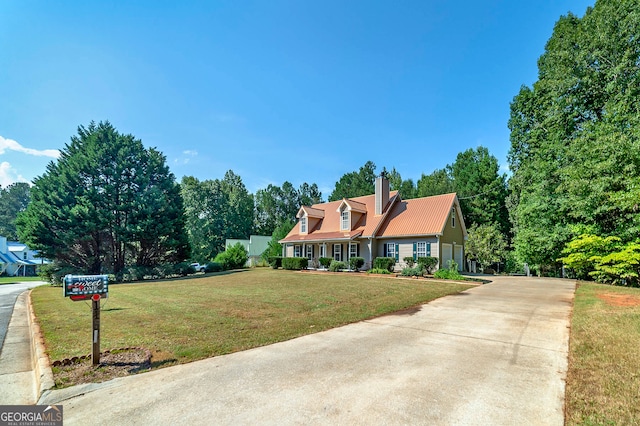 new england style home with a front lawn