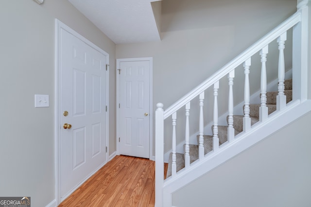 entrance foyer featuring hardwood / wood-style floors