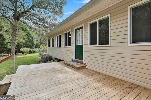 wooden deck with a yard