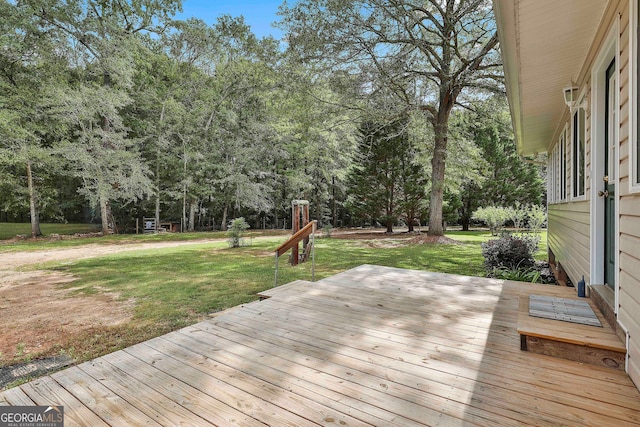 deck featuring a lawn