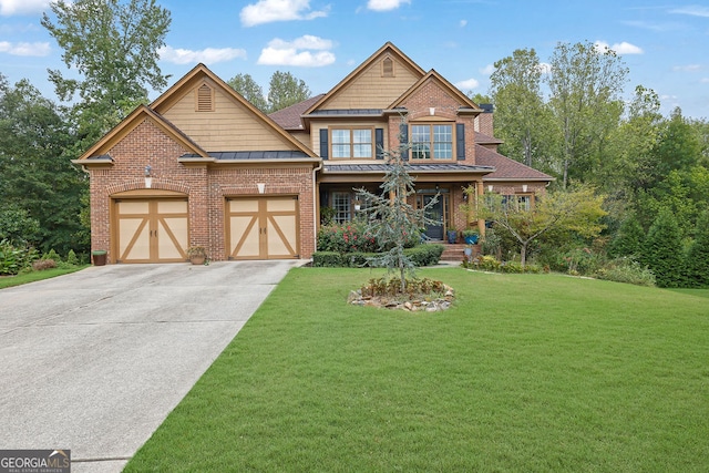 craftsman-style house with a front lawn and a garage