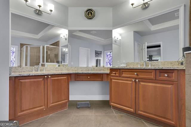 bathroom with vanity, an enclosed shower, tile patterned flooring, and crown molding