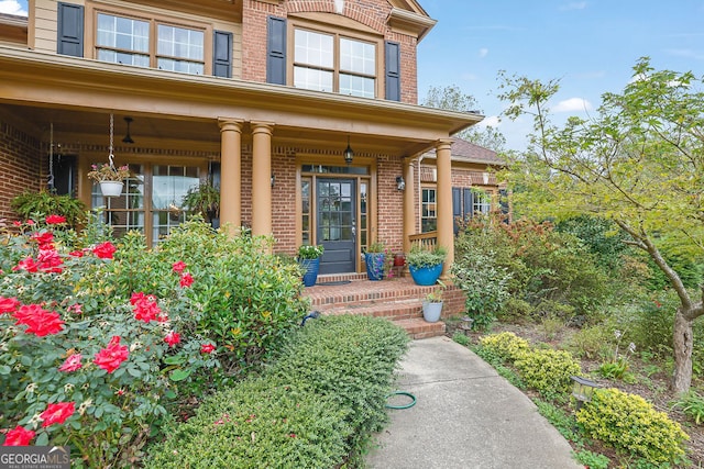 doorway to property with a porch