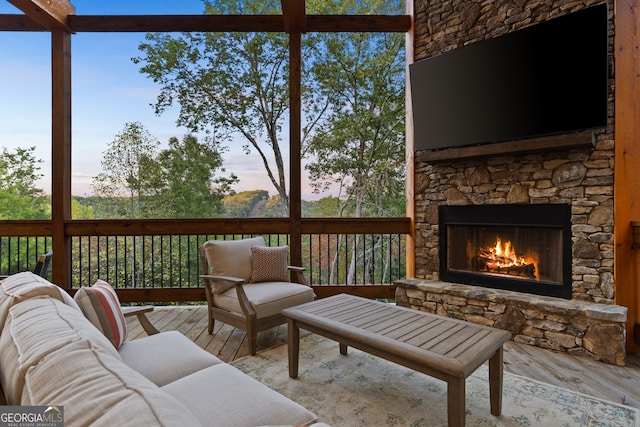 exterior space featuring a stone fireplace