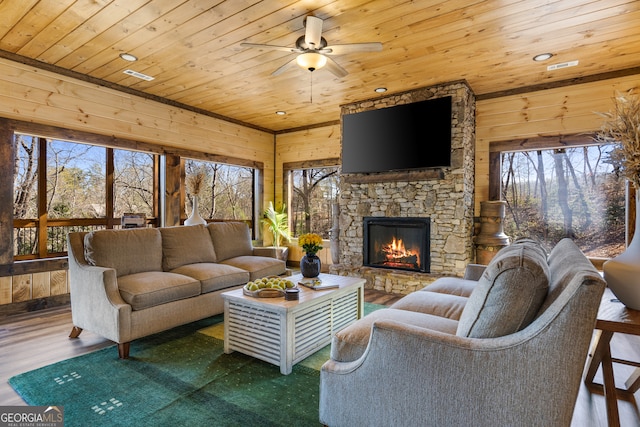 living room featuring wood ceiling, wood walls, and dark hardwood / wood-style flooring