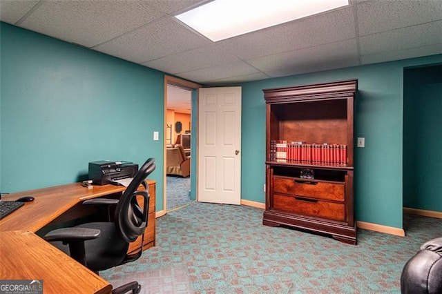 office area featuring carpet floors and a drop ceiling