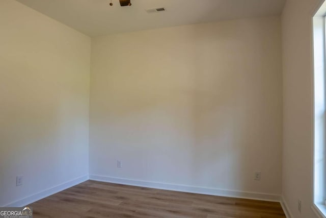 spare room with light wood-type flooring