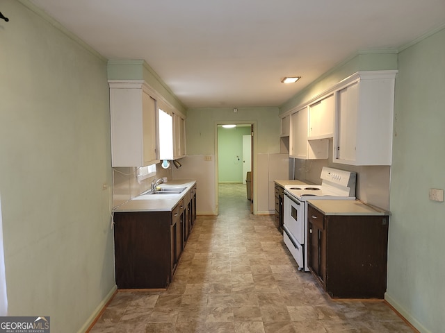 kitchen with white cabinetry, dark brown cabinetry, sink, and white electric range