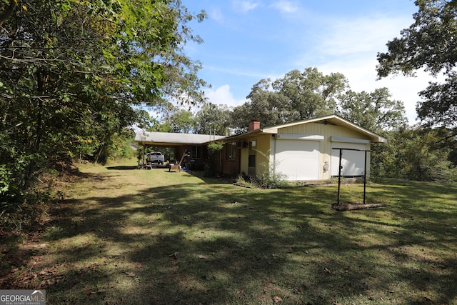 view of yard with a garage