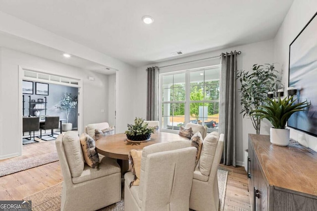 dining room with light hardwood / wood-style flooring