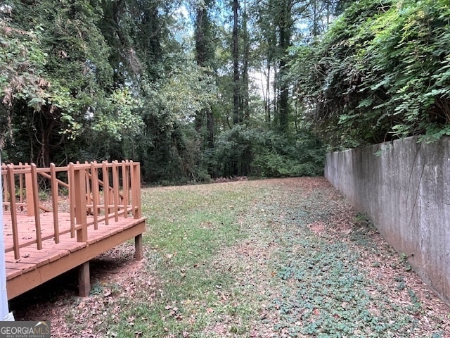 view of yard featuring a deck