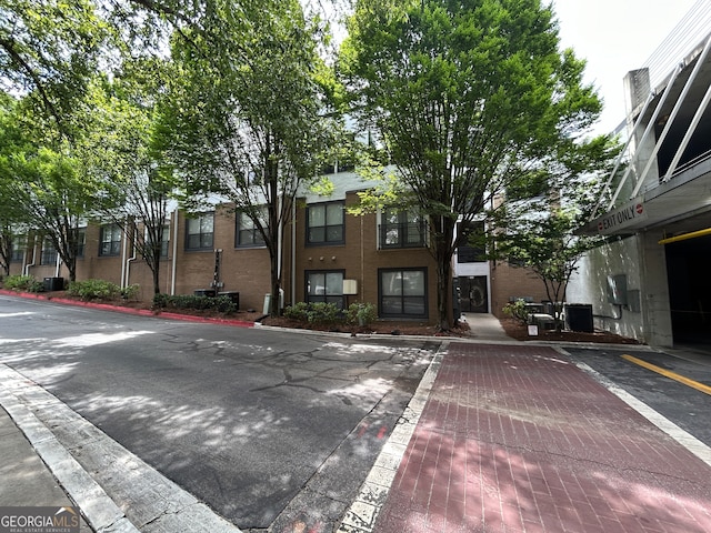 view of building exterior featuring central AC unit