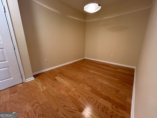 spare room featuring light wood-type flooring