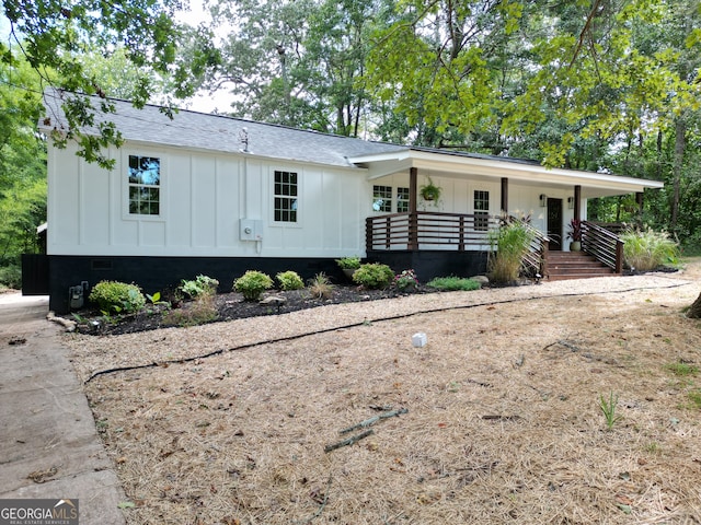 view of front of home featuring covered porch