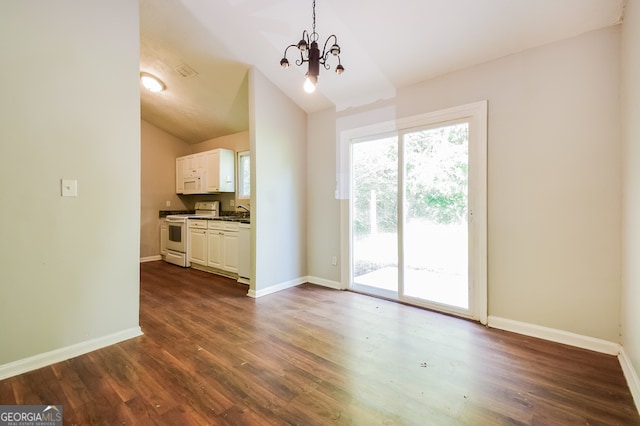 unfurnished living room with a notable chandelier, lofted ceiling, and dark hardwood / wood-style flooring