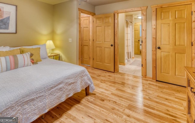 bedroom featuring hardwood / wood-style floors