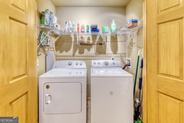 washroom with separate washer and dryer