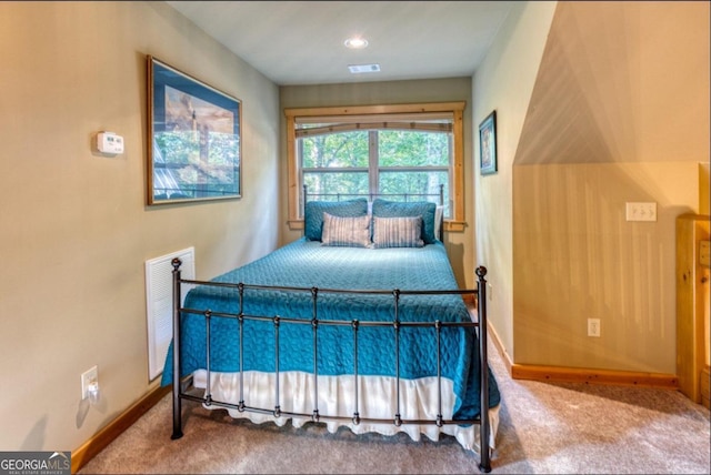 bedroom featuring carpet