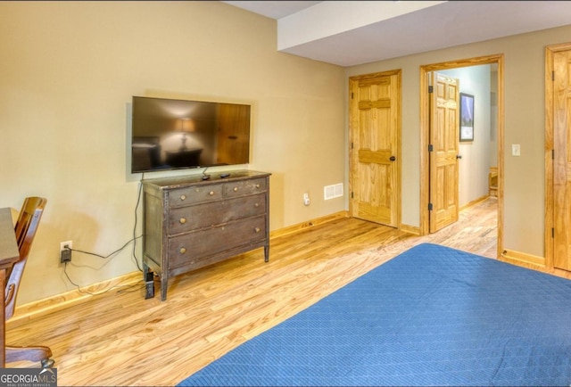 bedroom featuring light hardwood / wood-style flooring