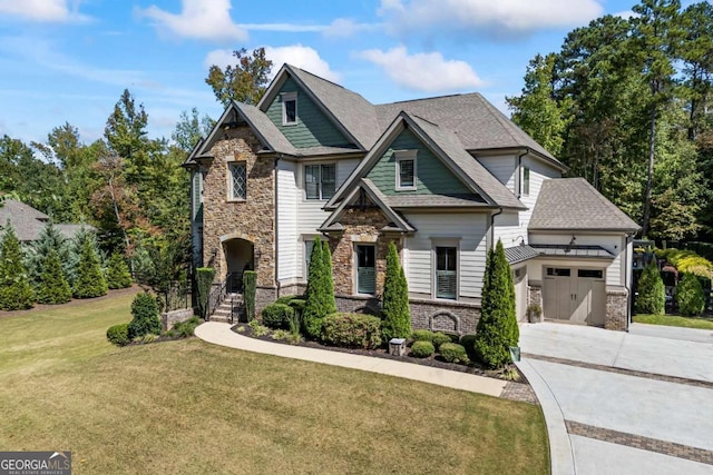 craftsman-style home with a garage and a front lawn