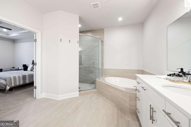 bathroom with vanity and plus walk in shower