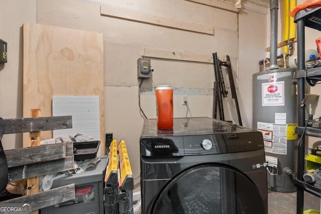 interior space with gas water heater and washer / dryer